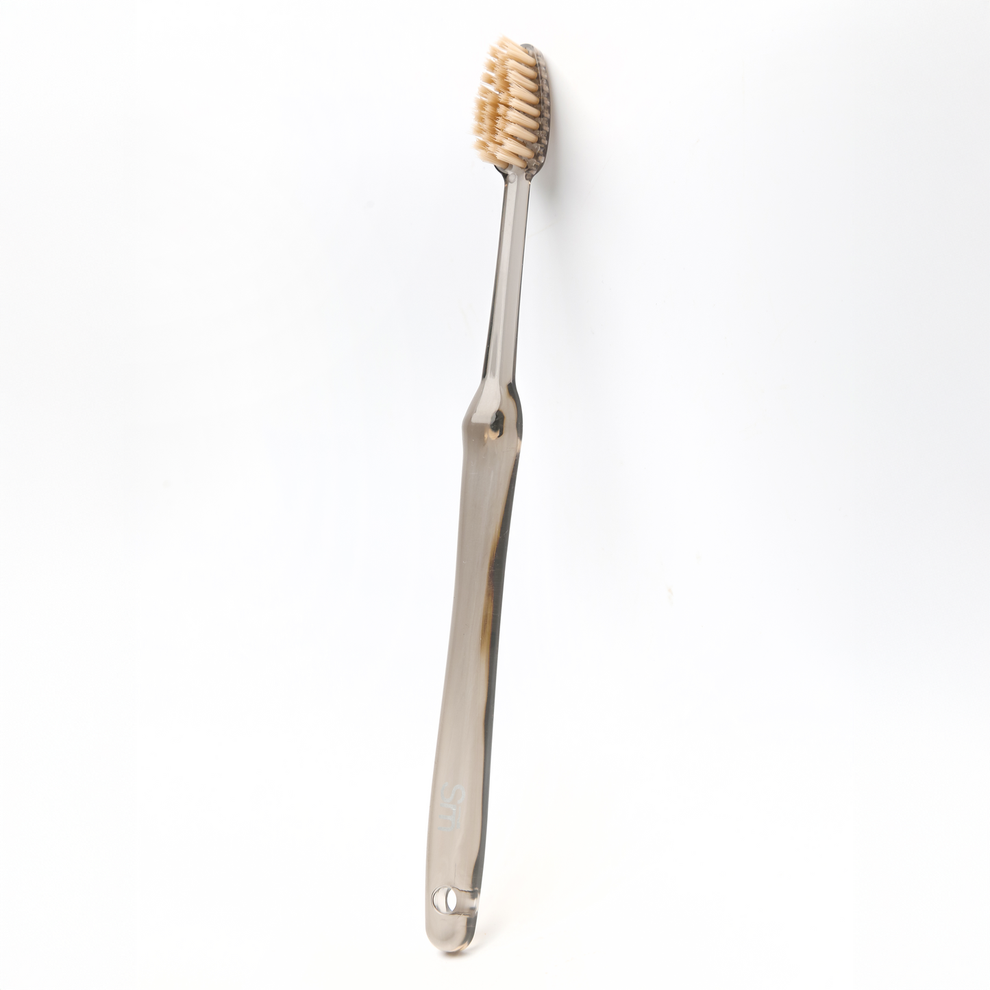 Black toothbrush on a white background