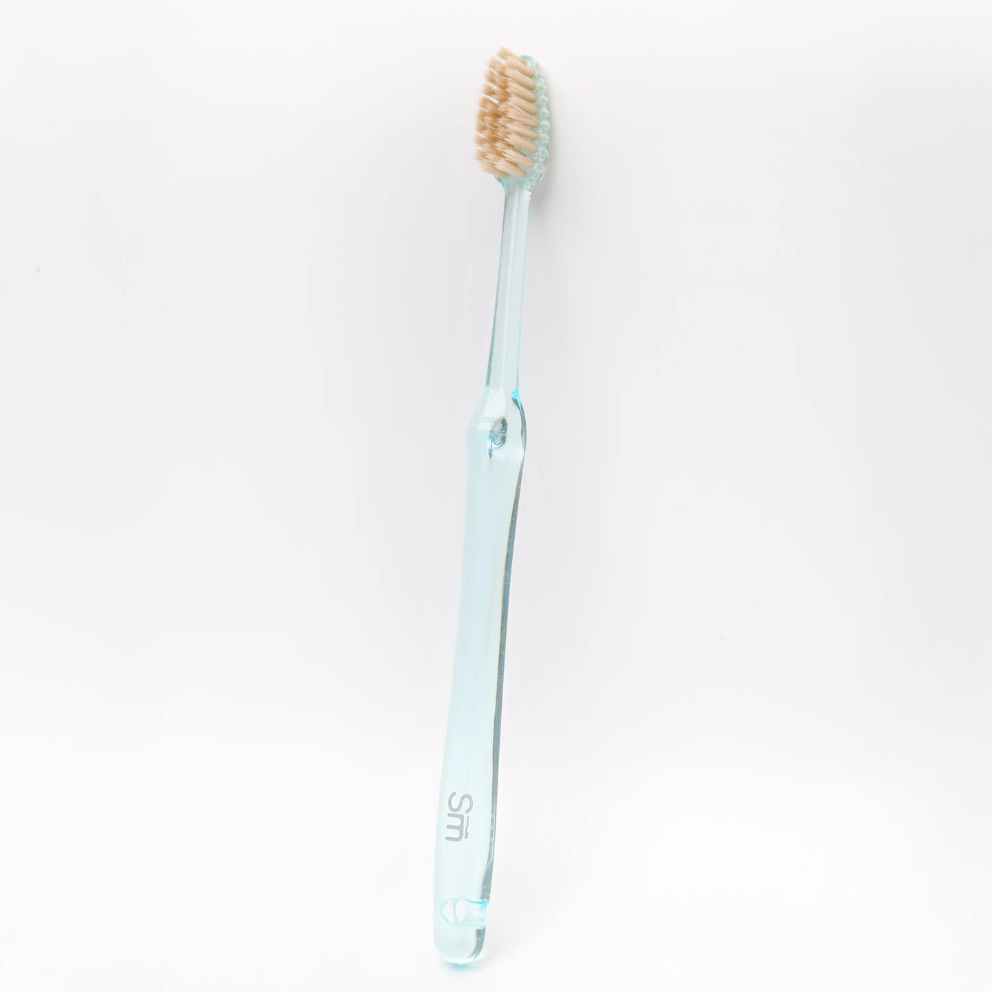 Blue toothbrush on a white background