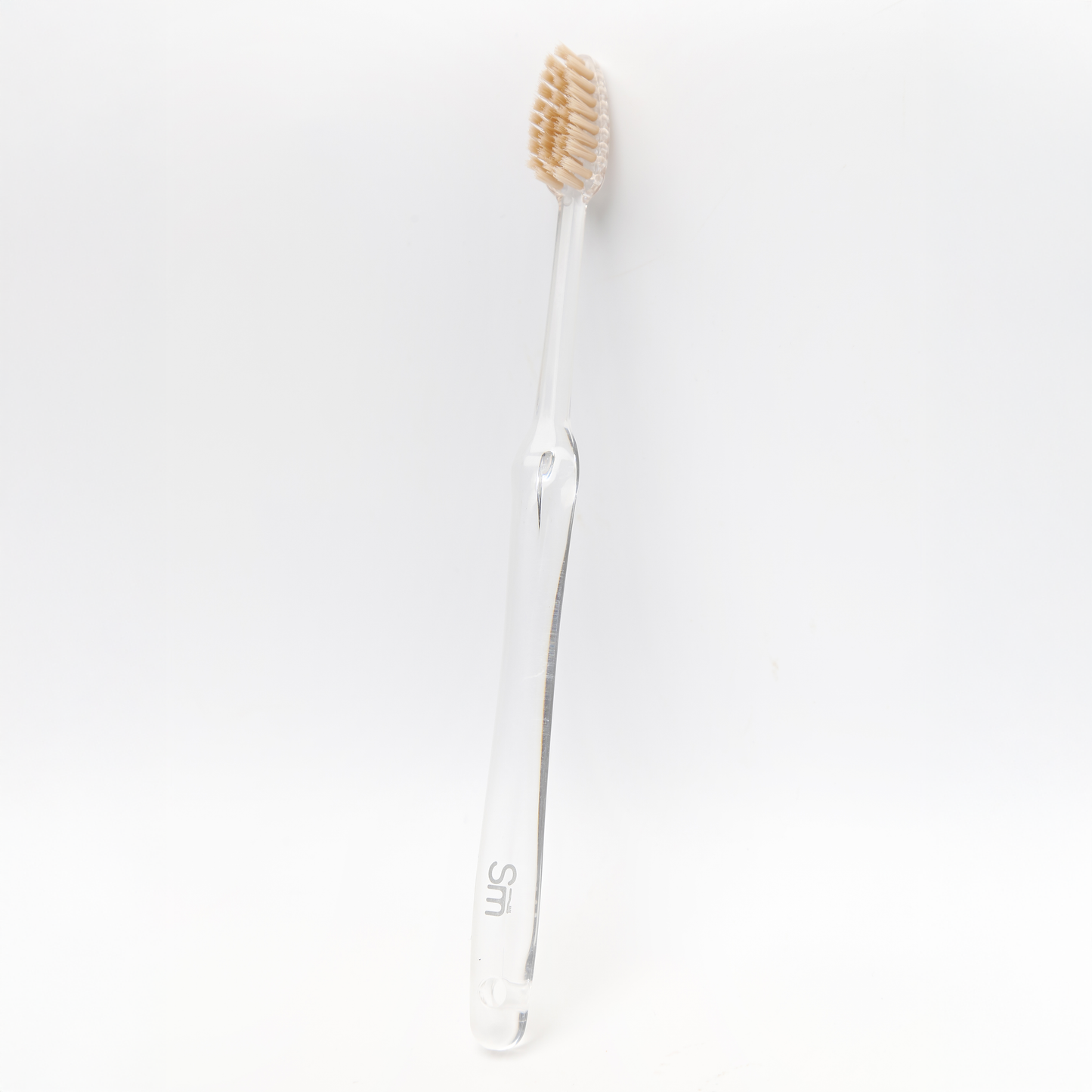 White toothbrush on a white background