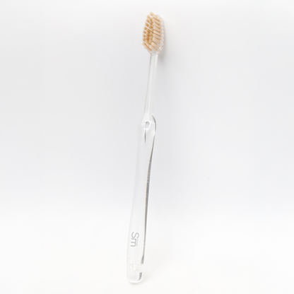 White toothbrush on a white background